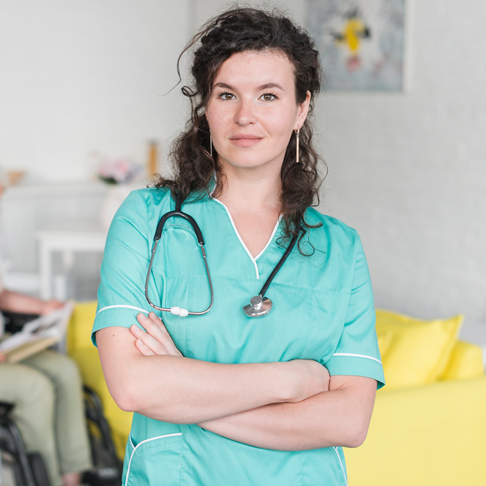 portrait-young-female-nurse-standing-front-senior-woman-sitting-wheel-chair-2