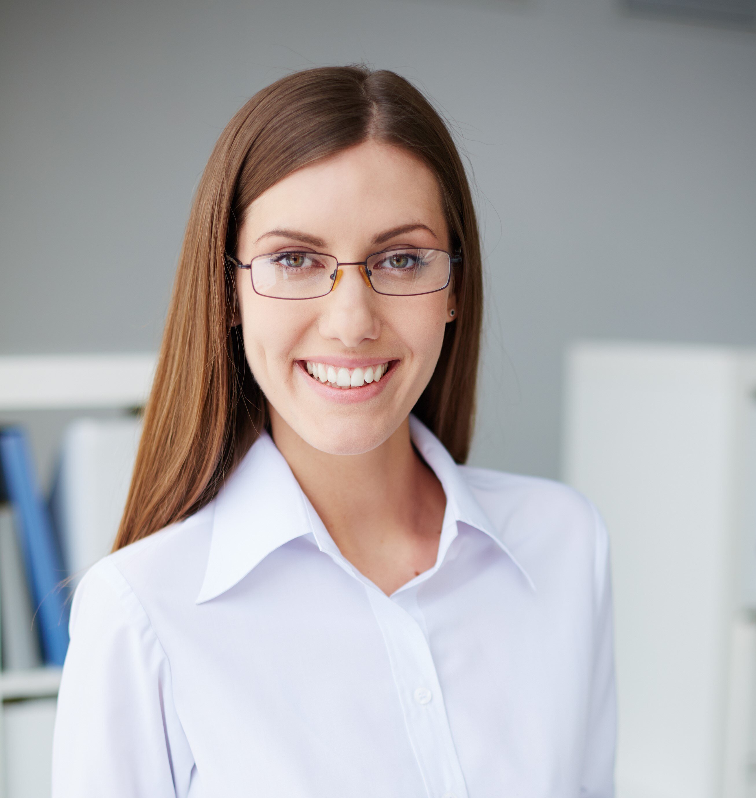 smiling-secretary-holding-clipboard-with-report-1